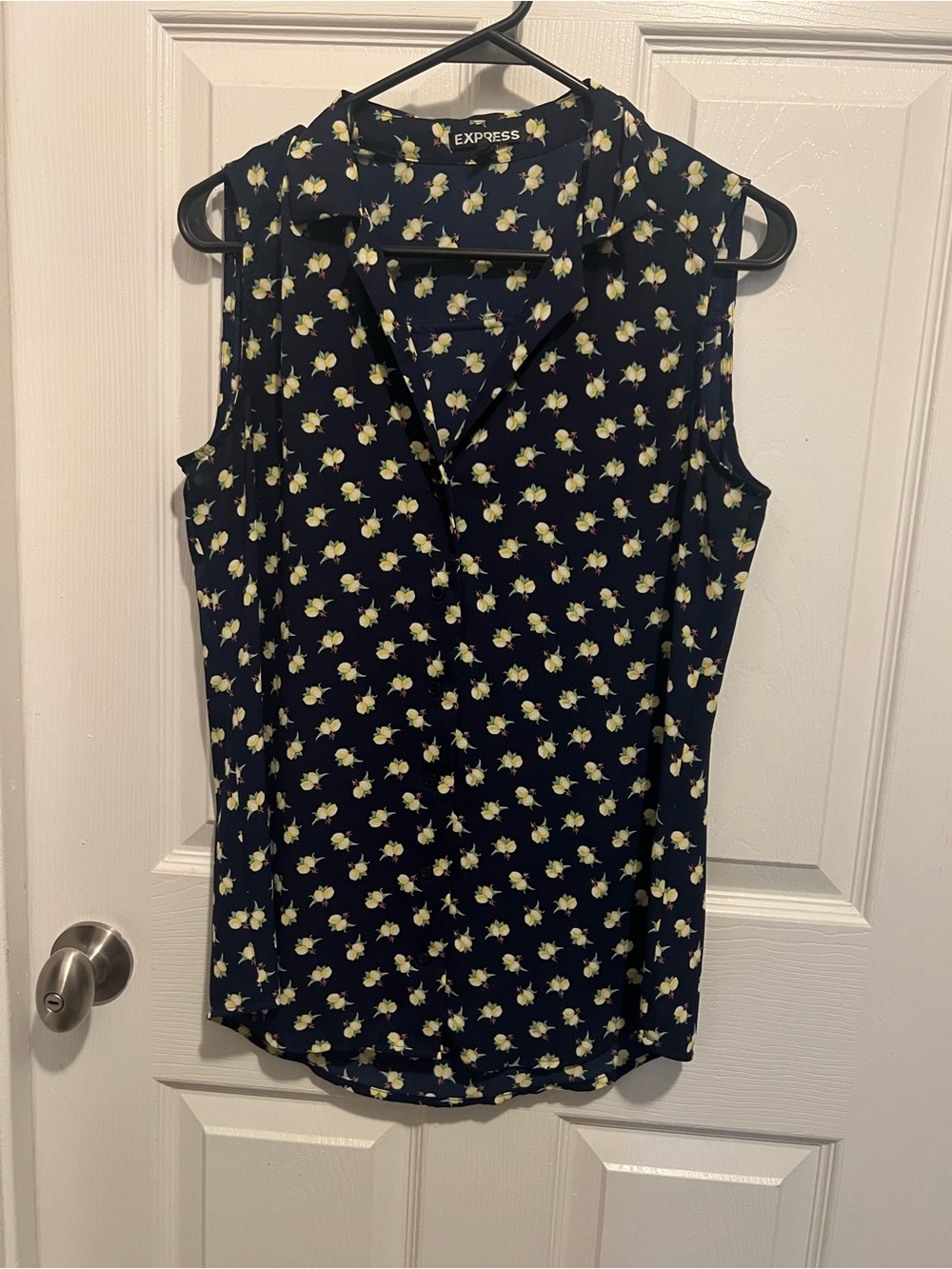 Express Navy Sleeveless Blouse with Yellow Floral Pattern